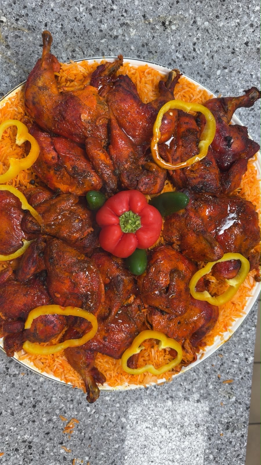 Grilled chicken platter over red rice