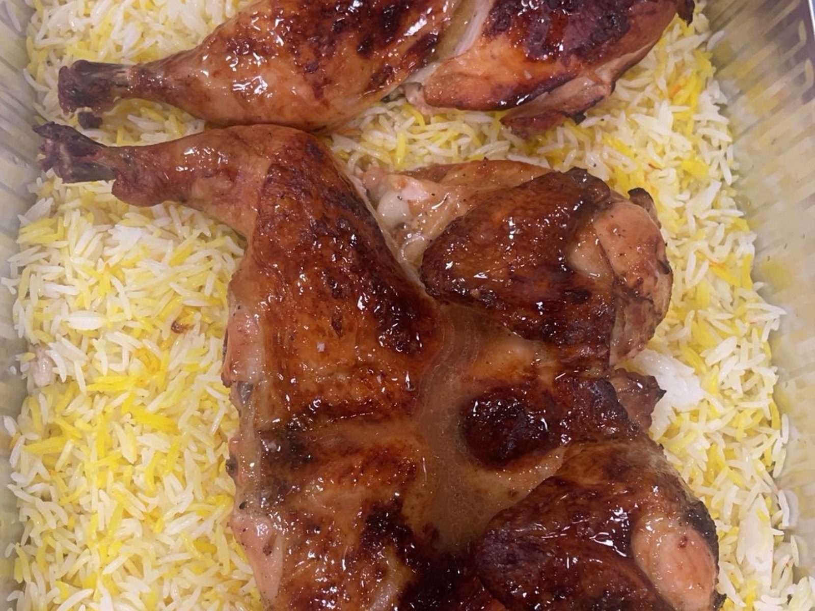 Grilled chicken over saffron rice catering tray